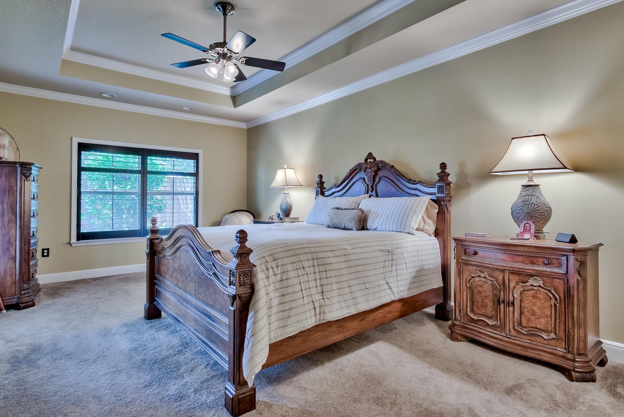 386 Pin Oak Loop Santa Rosa Beach, FL 32459 - Photo 18 of 47 a bedroom with a bed and a window