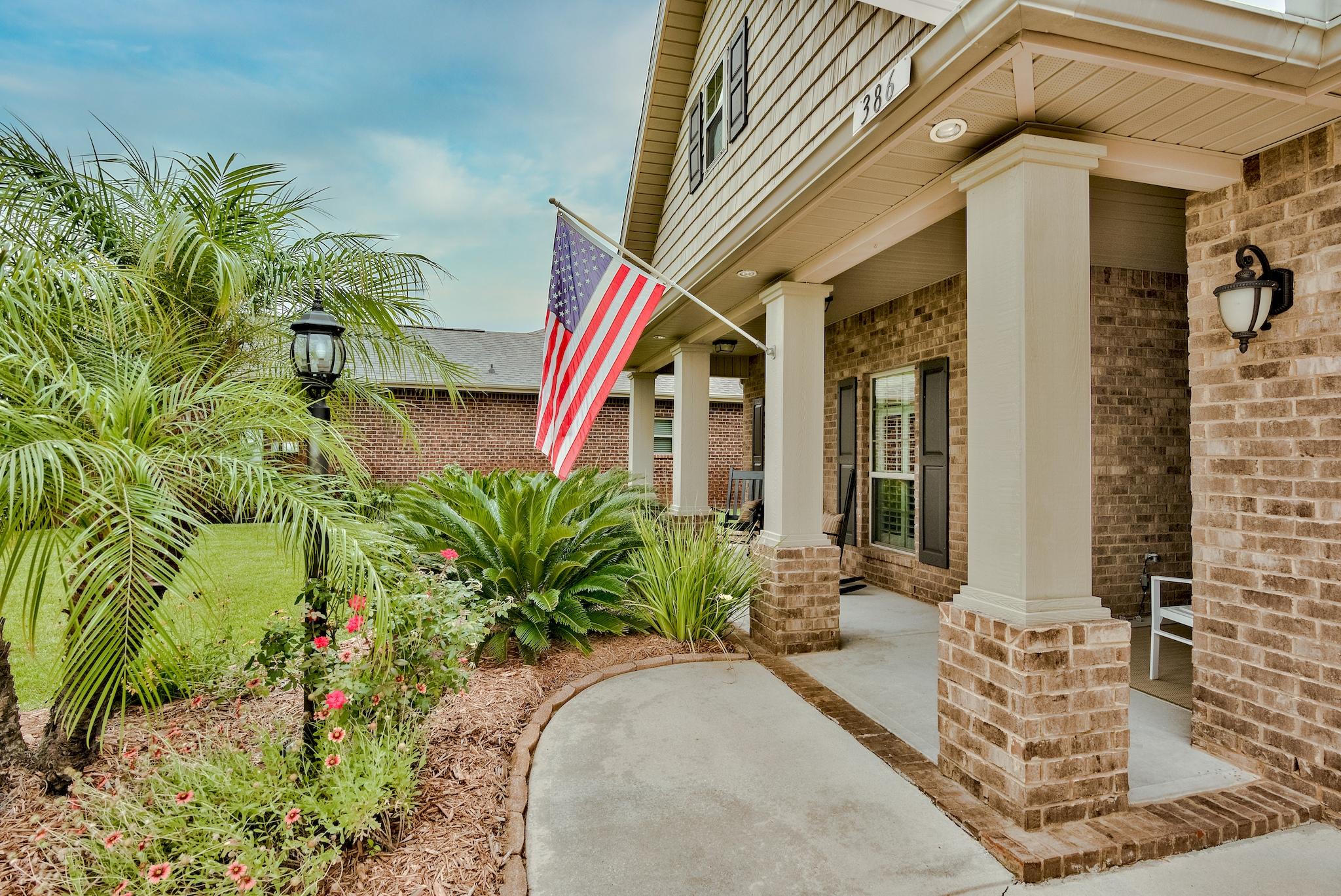 386 Pin Oak Loop Santa Rosa Beach, FL 32459 - Photo 6 of 47 a house view with a outdoor space