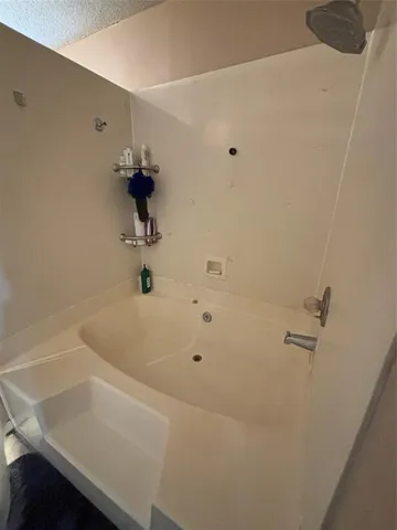 a bathroom with a bathtub