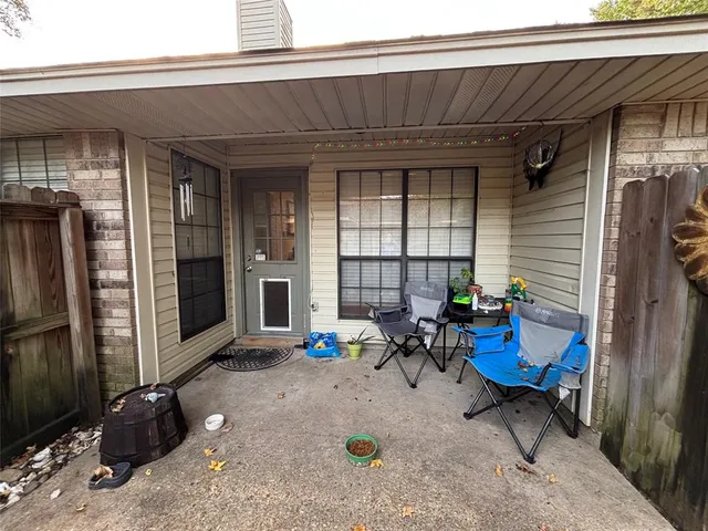 an outdoor space with furniture