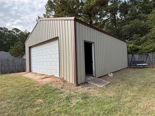 a house with trees in front of it