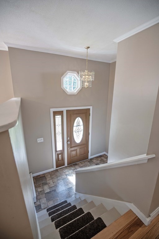 182 Ayer Road Shirley, MA 01464 - Photo 17 of 35 a view of kitchen cabinets and wooden floor