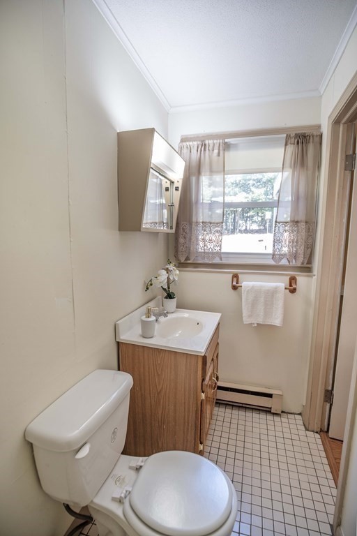 182 Ayer Road Shirley, MA 01464 - Photo 24 of 35 a bathroom with a sink toilet and window
