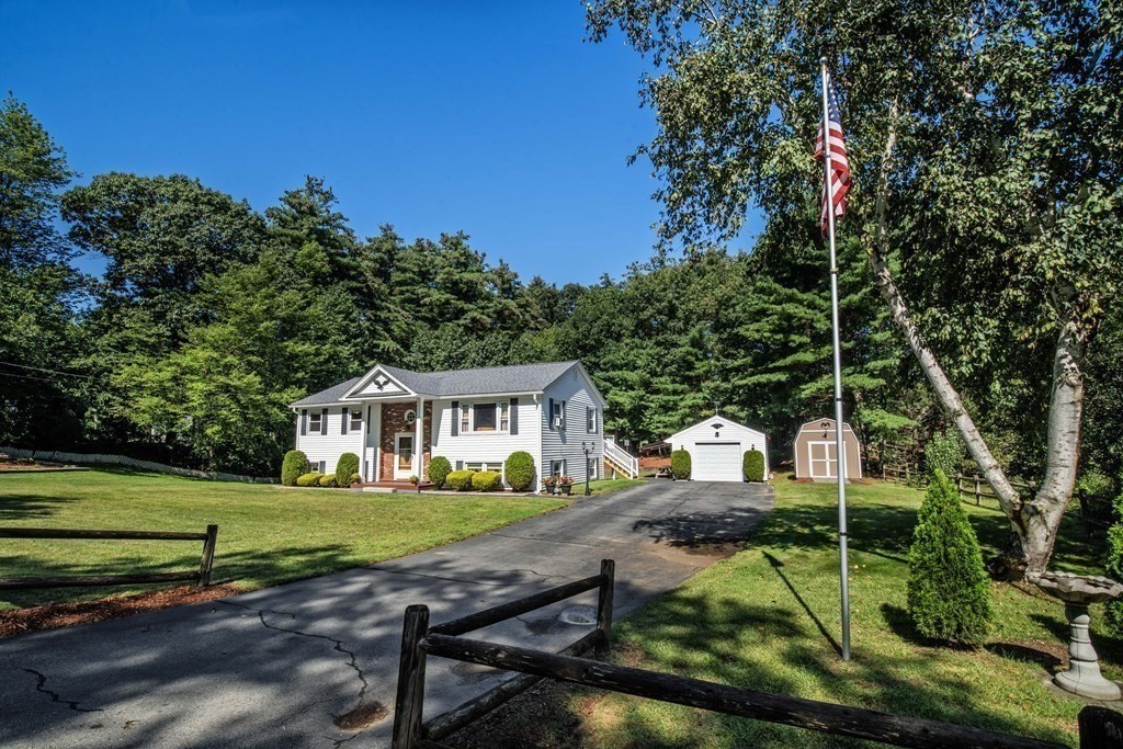 182 Ayer Road Shirley, MA 01464 - Photo 25 of 35 a house view with a garden space