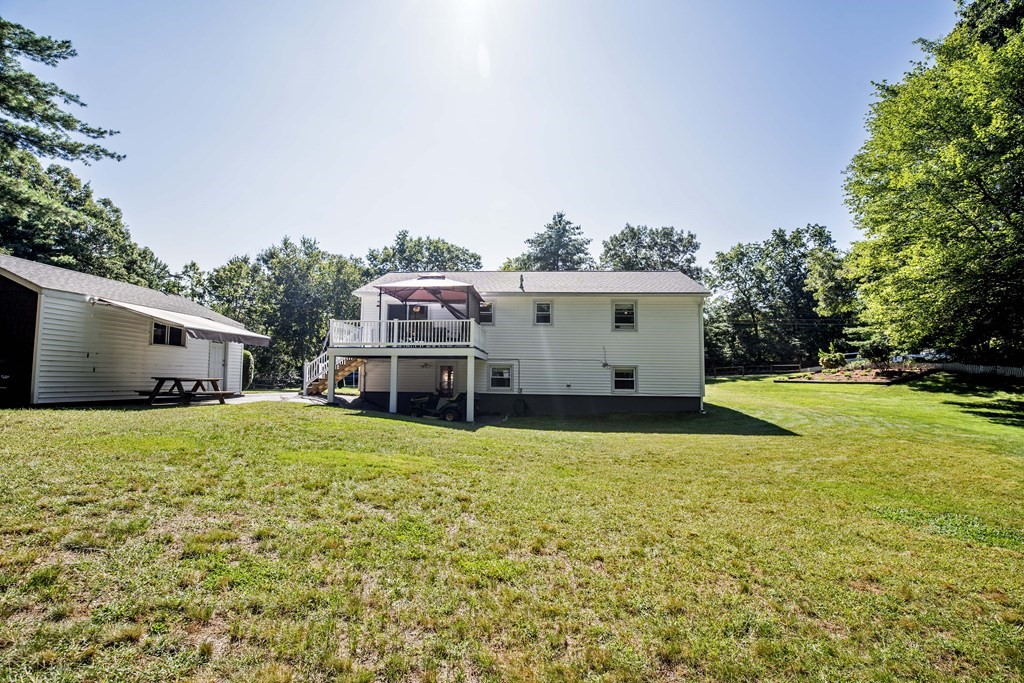 182 Ayer Road Shirley, MA 01464 - Photo 31 of 35 a house view with a sitting space and garden