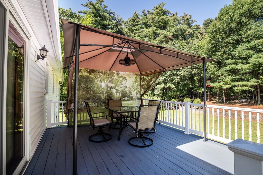 182 Ayer Road Shirley, MA 01464 - Photo 33 of 35 a view of a chair and table on the deck