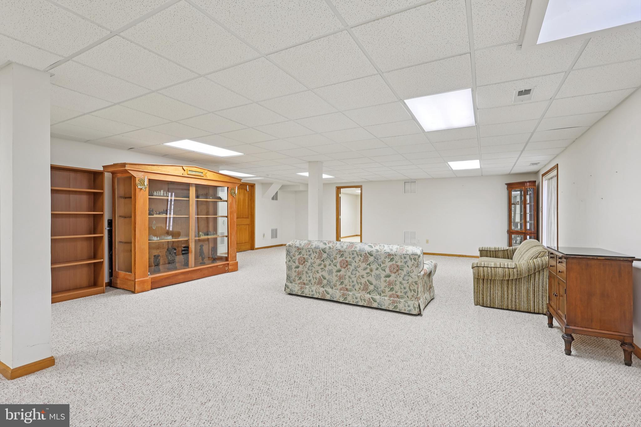 2 Kyle Court Mount Laurel, NJ 08054 - Photo 35 of 42 a living room with furniture cabinets and window