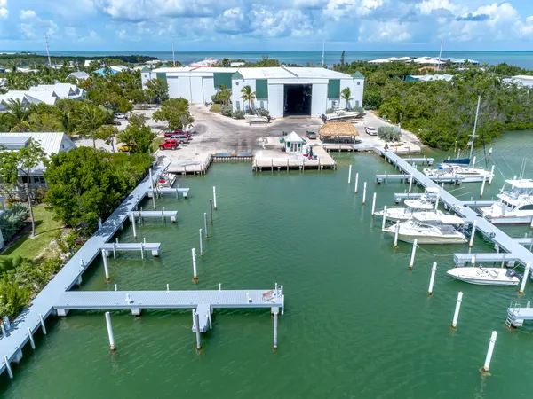 a backyard of a house with outdoor seating and green space