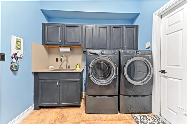 a bedroom with a bed and furniture