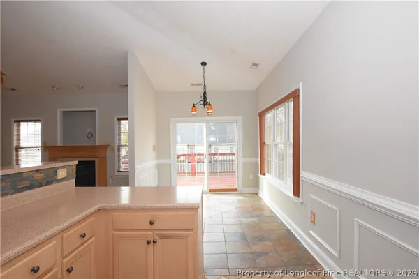 a kitchen with a refrigerator a sink and dishwasher