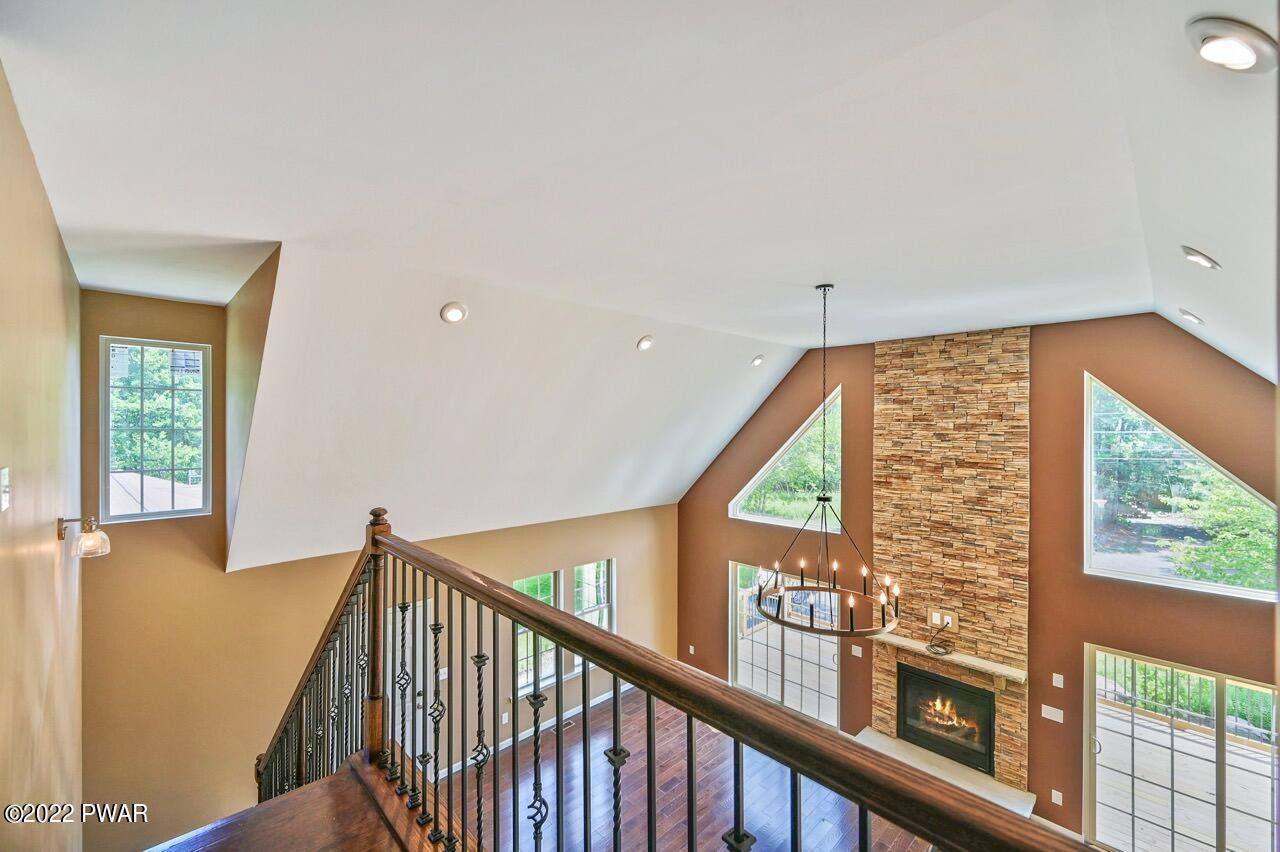 45 Rockway Road Lake Ariel, PA 18436 - Photo 44 of 65 a view of staircase with a large window and wooden floor