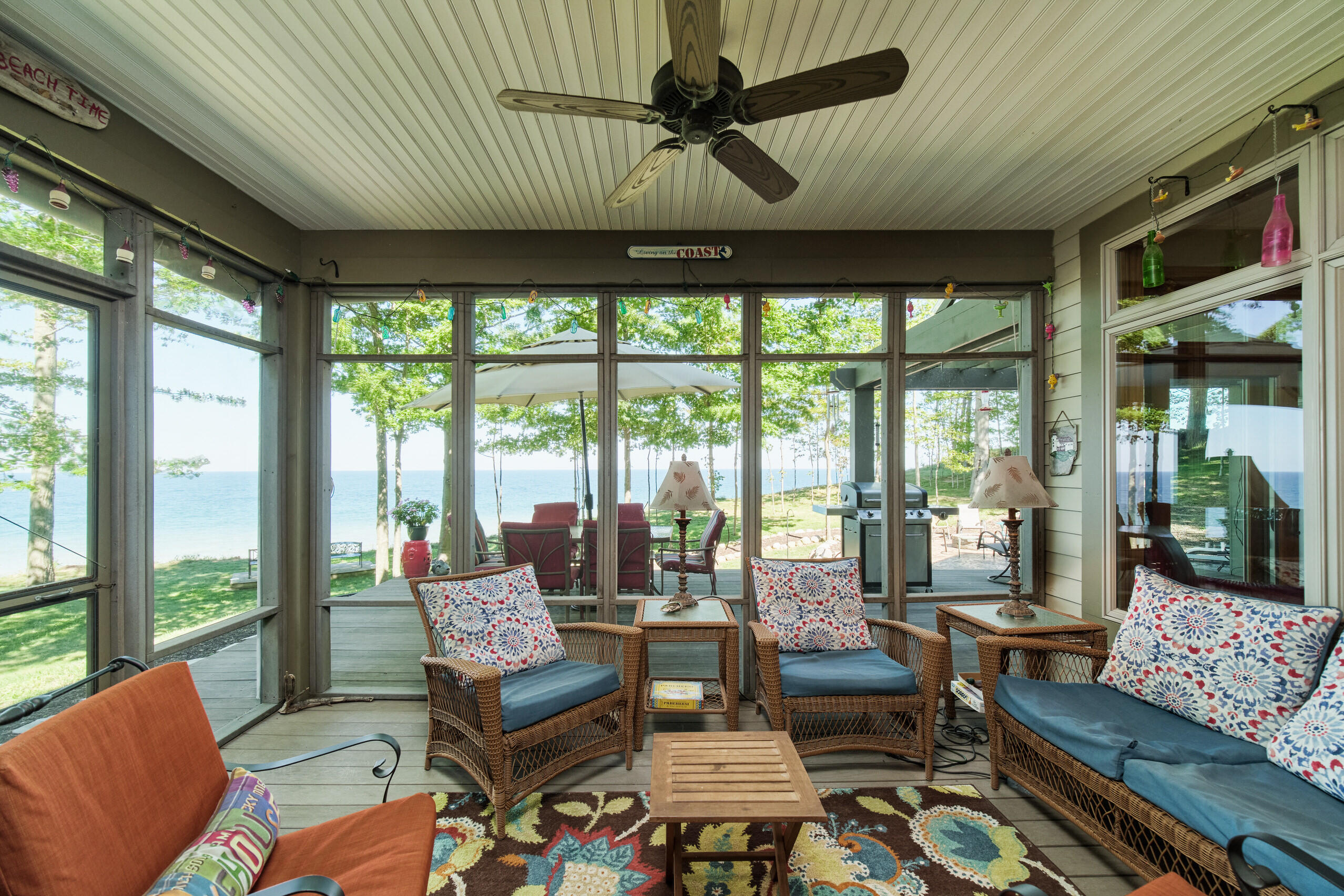 4582 West Fox Farm Road Manistee, MI 49660 - Photo 21 of 80 Screened porch for quiet relaxation