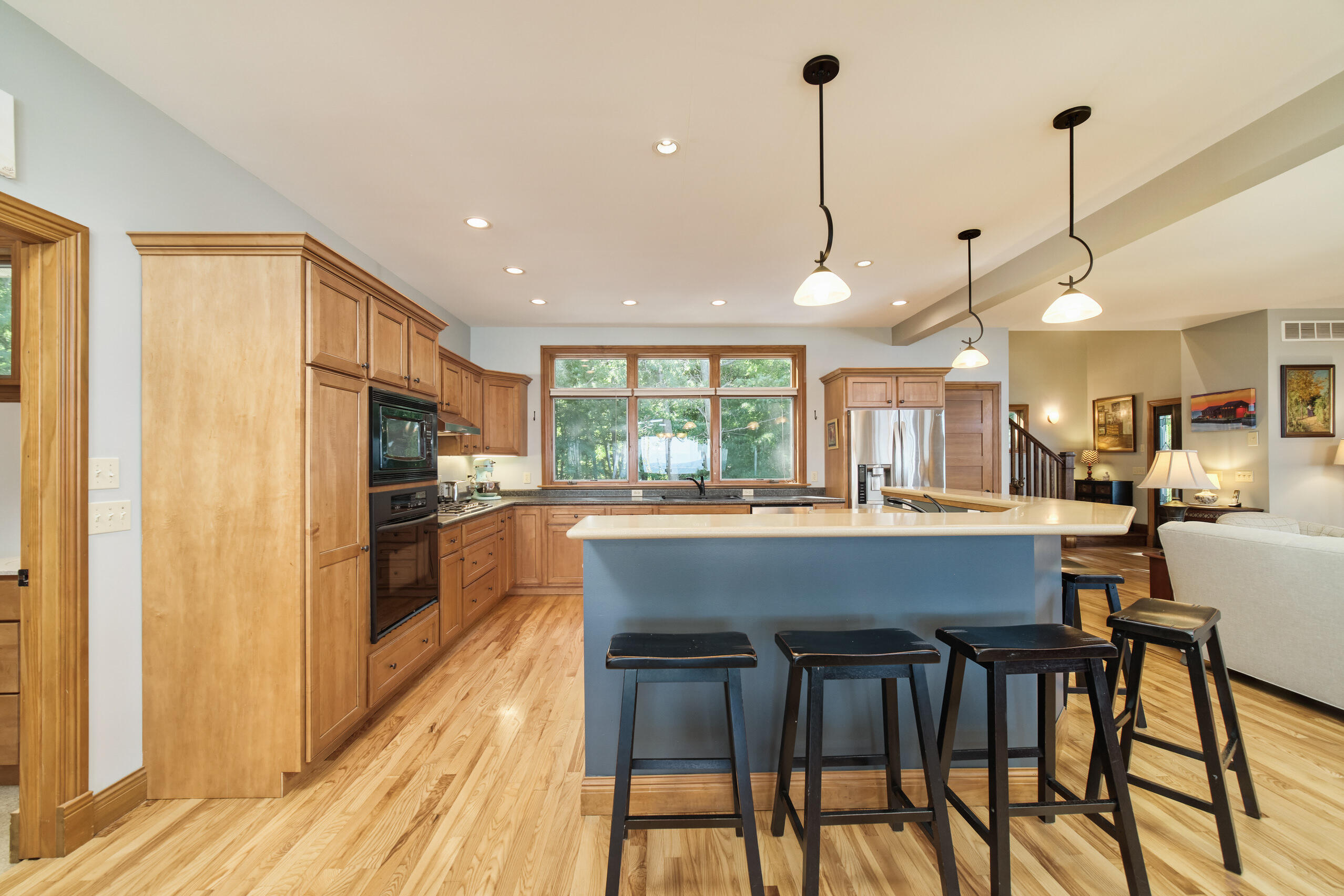 4582 West Fox Farm Road Manistee, MI 49660 - Photo 29 of 80 Six bar stools easily around island