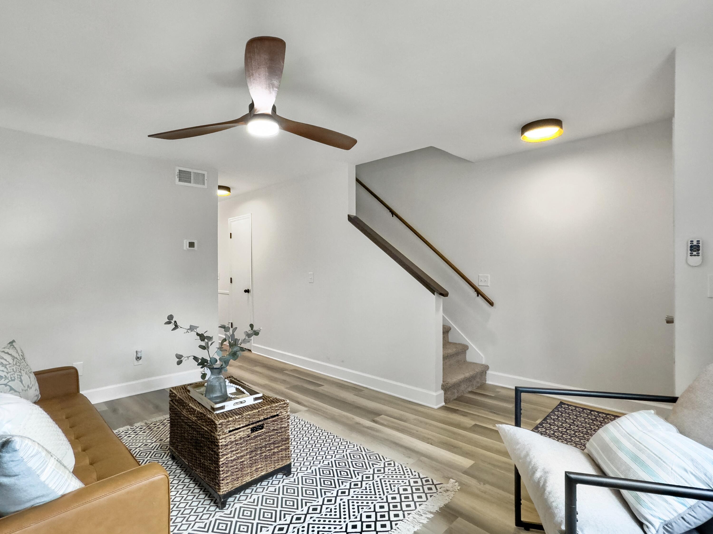306 Crestview Drive, Unit B Summerville, SC 29485 - Photo 6 of 24 Living room with stairs
