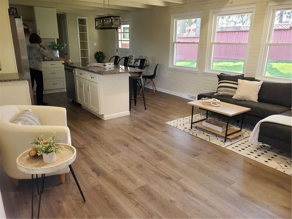 27 North Johnson Road Houston, PA 15342 - Photo 13 of 25 a living room with furniture and a wooden floor