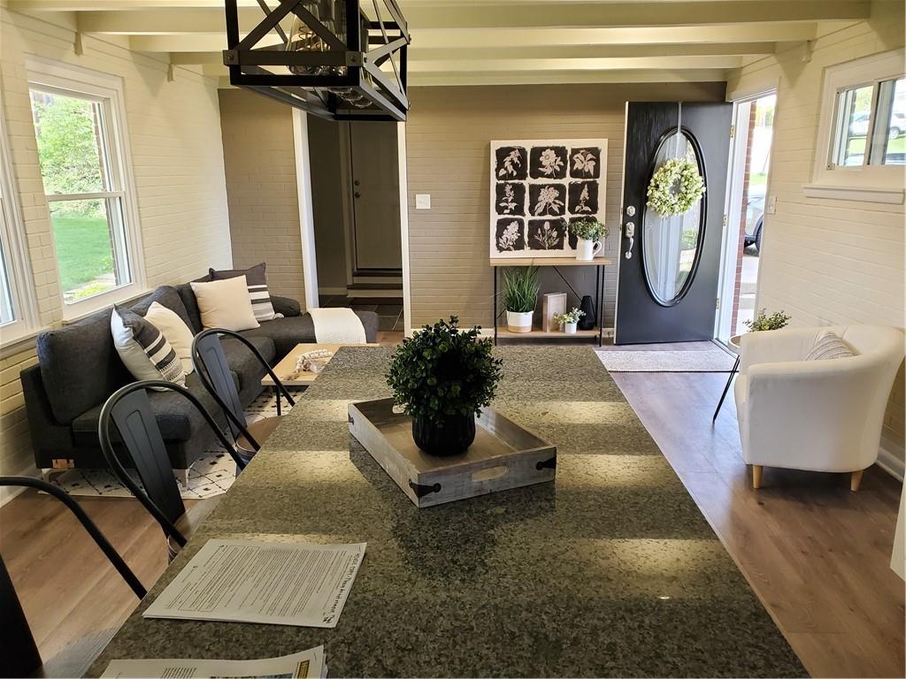 27 North Johnson Road Houston, PA 15342 - Photo 14 of 25 a living room with furniture and a large window