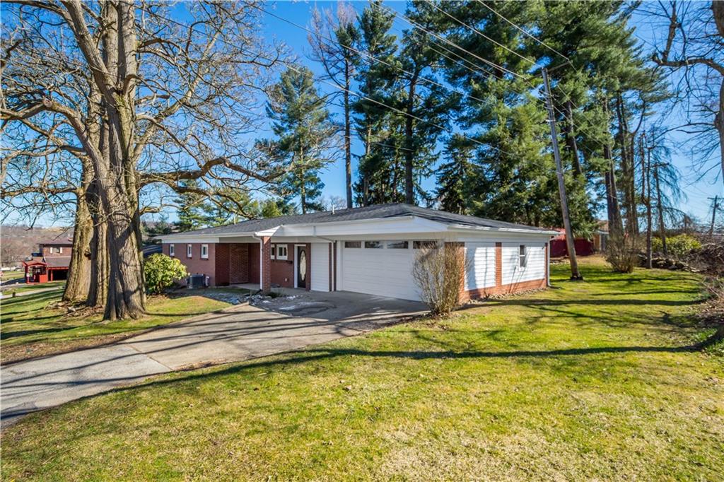 27 North Johnson Road Houston, PA 15342 - Photo 2 of 25 a view of a house with a big yard and large tree