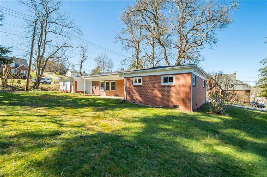 27 North Johnson Road Houston, PA 15342 - Photo 3 of 25 a view of a house with a big yard