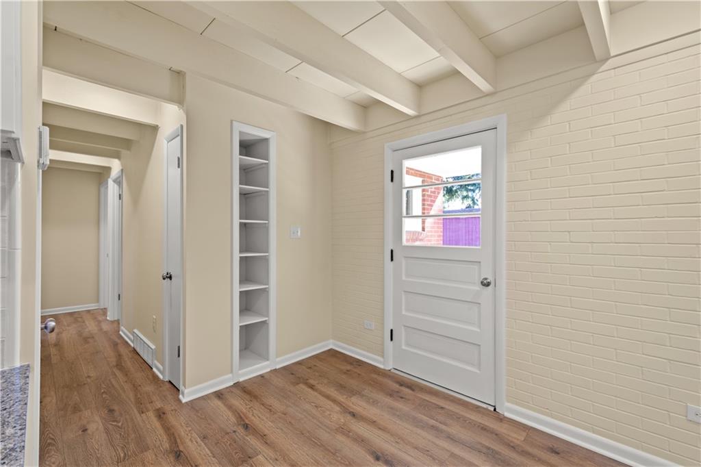 27 North Johnson Road Houston, PA 15342 - Photo 9 of 25 wooden floor in an empty room with a window