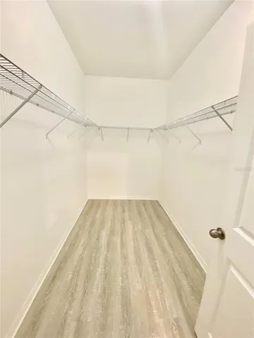 a view of a room with racks on the wall