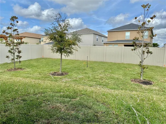 a house view with a garden space