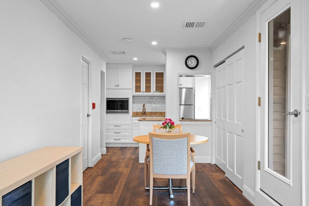 35 Des Moines Road, Unit 310 Quincy, MA 02169 - Photo 15 of 22 a very nice looking dining room with furniture window and wooden floor