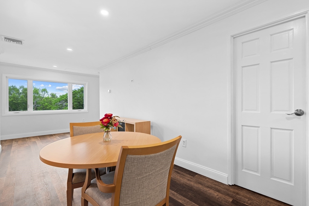 35 Des Moines Road, Unit 310 Quincy, MA 02169 - Photo 8 of 22 a view of a dining room with furniture and window