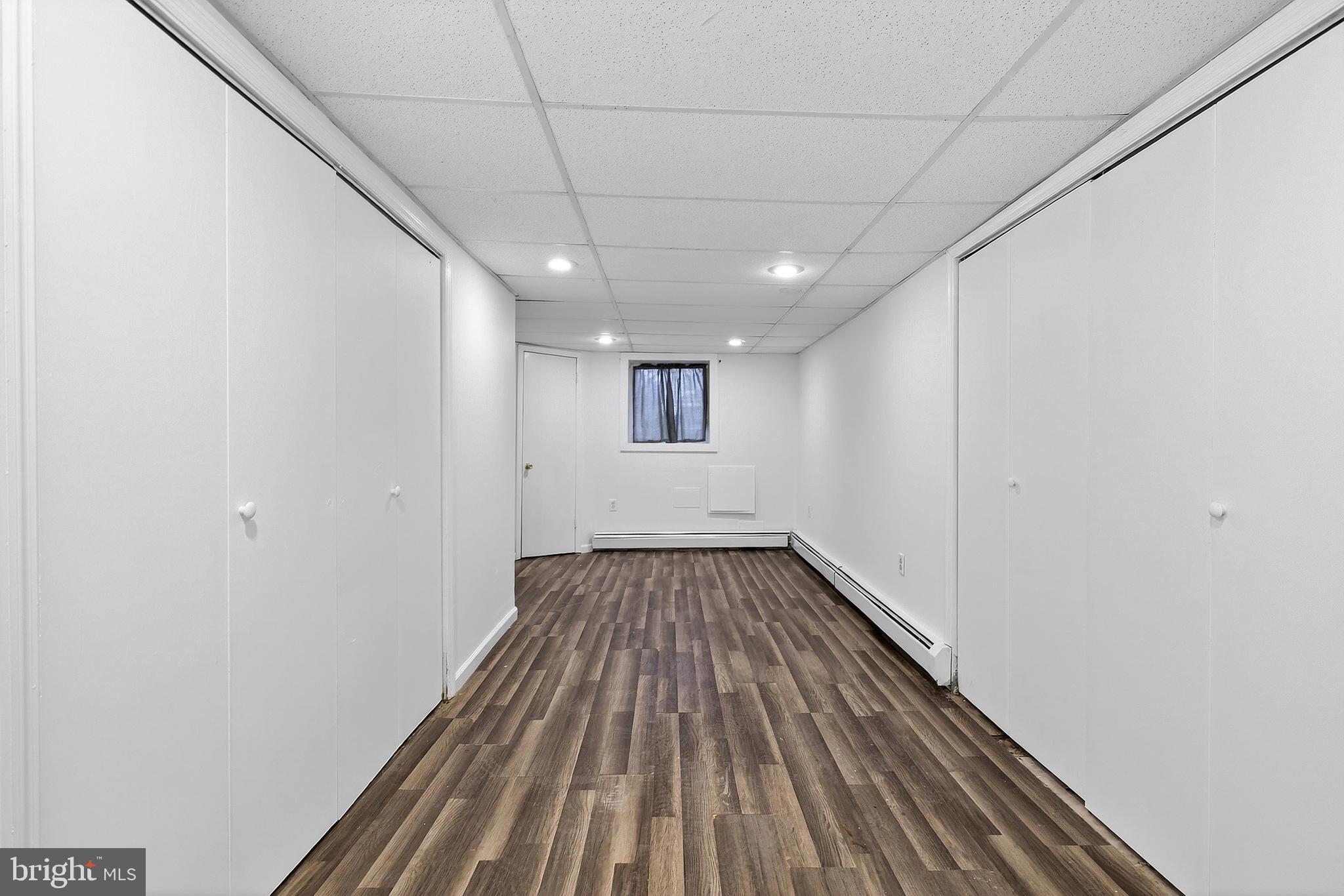 412 West Maple Avenue Merchantville, NJ 08109 - Photo 22 of 58 a view of a hallway with wooden floor