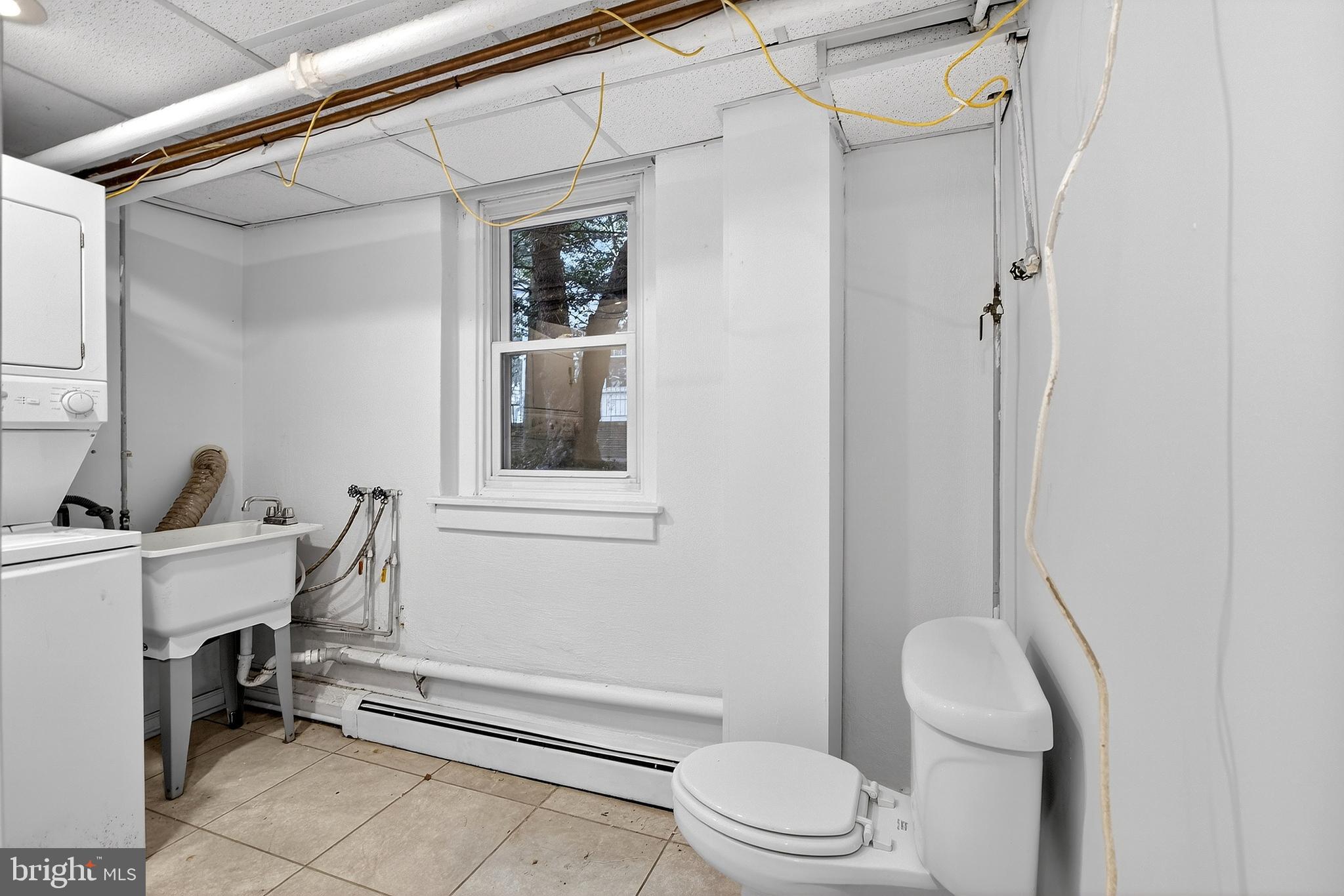 412 West Maple Avenue Merchantville, NJ 08109 - Photo 24 of 58 a bathroom with a toilet a sink and a shower