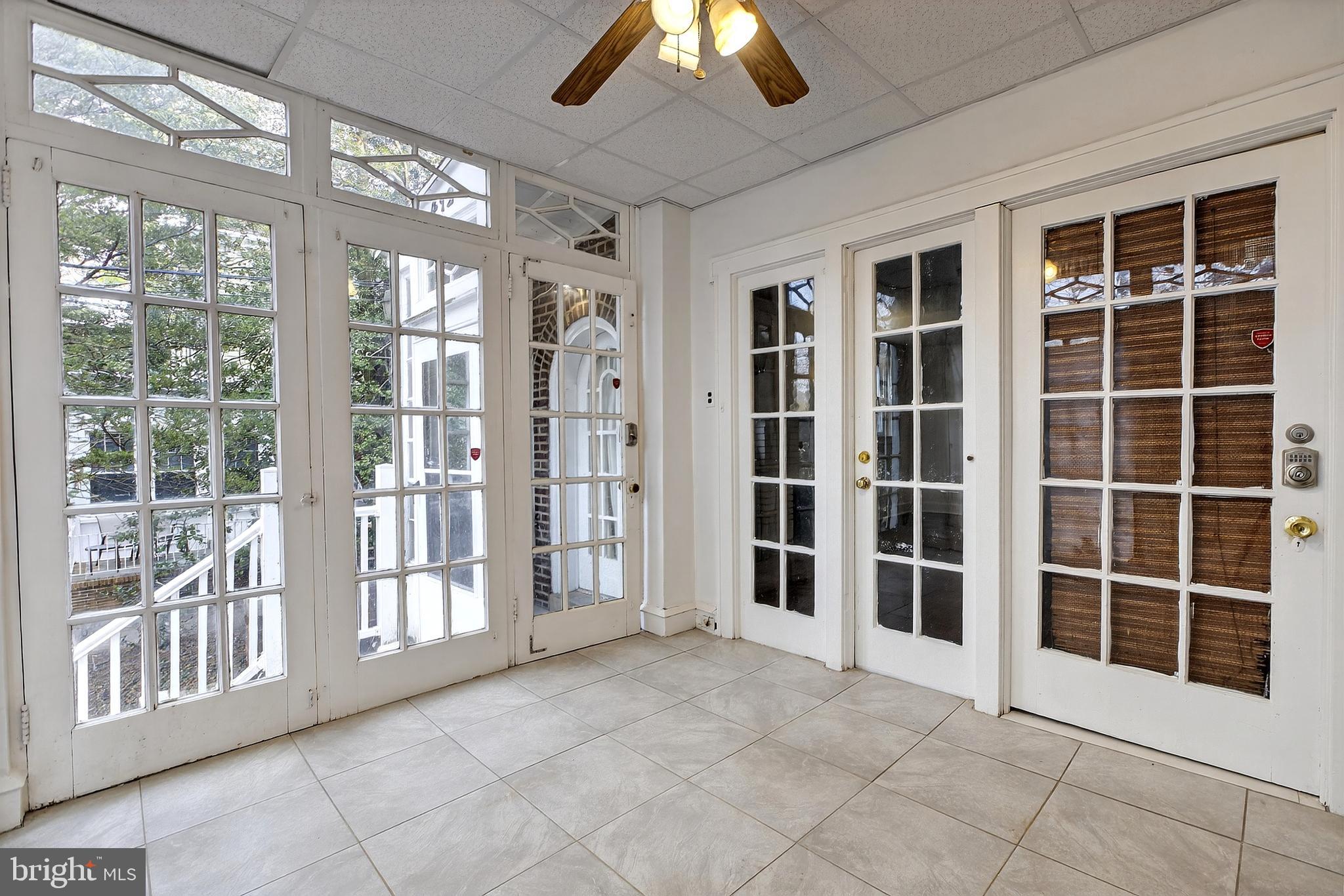 412 West Maple Avenue Merchantville, NJ 08109 - Photo 32 of 58 a view of an empty room with a window and chandelier fan