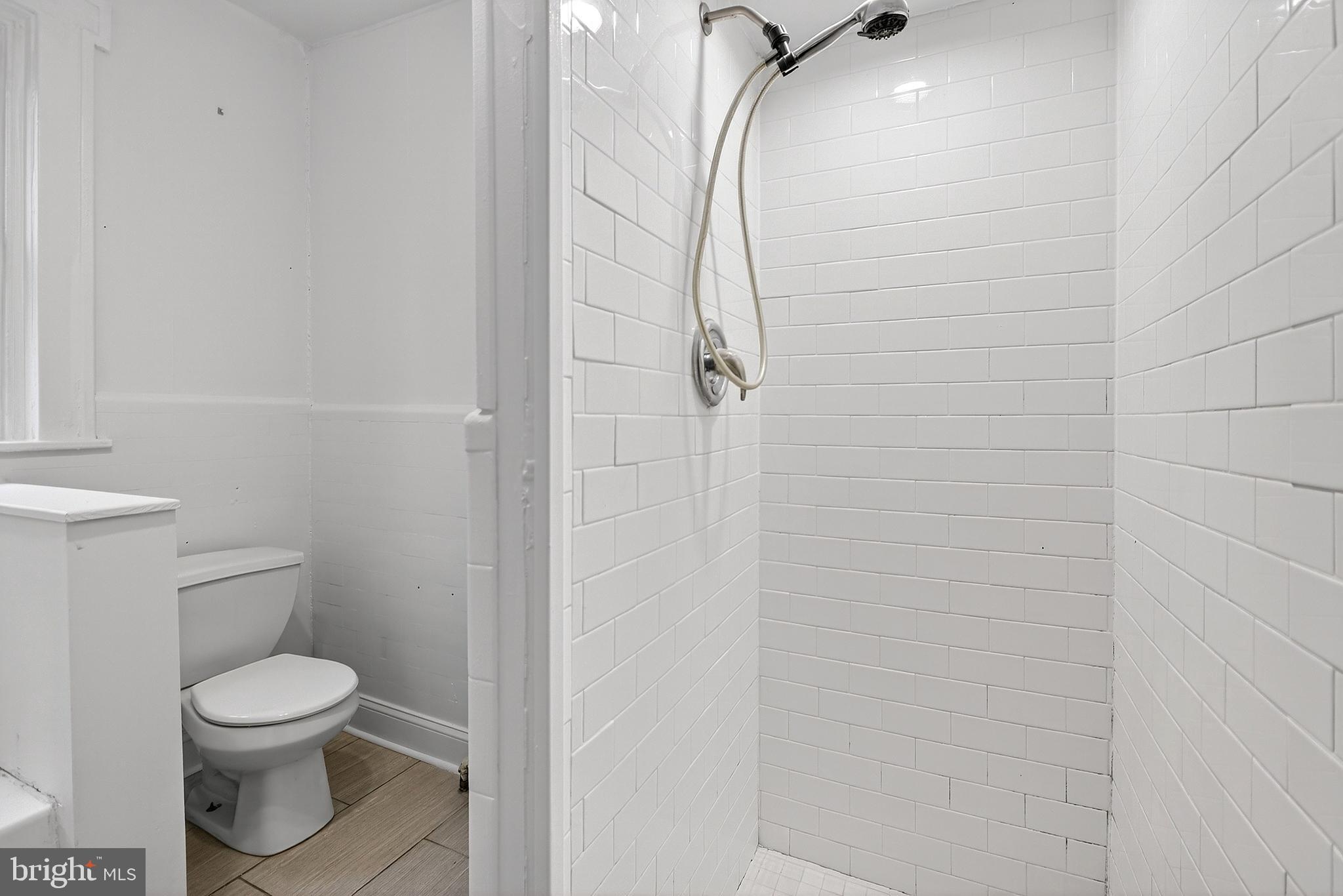 412 West Maple Avenue Merchantville, NJ 08109 - Photo 42 of 58 a bathroom with a toilet and shower