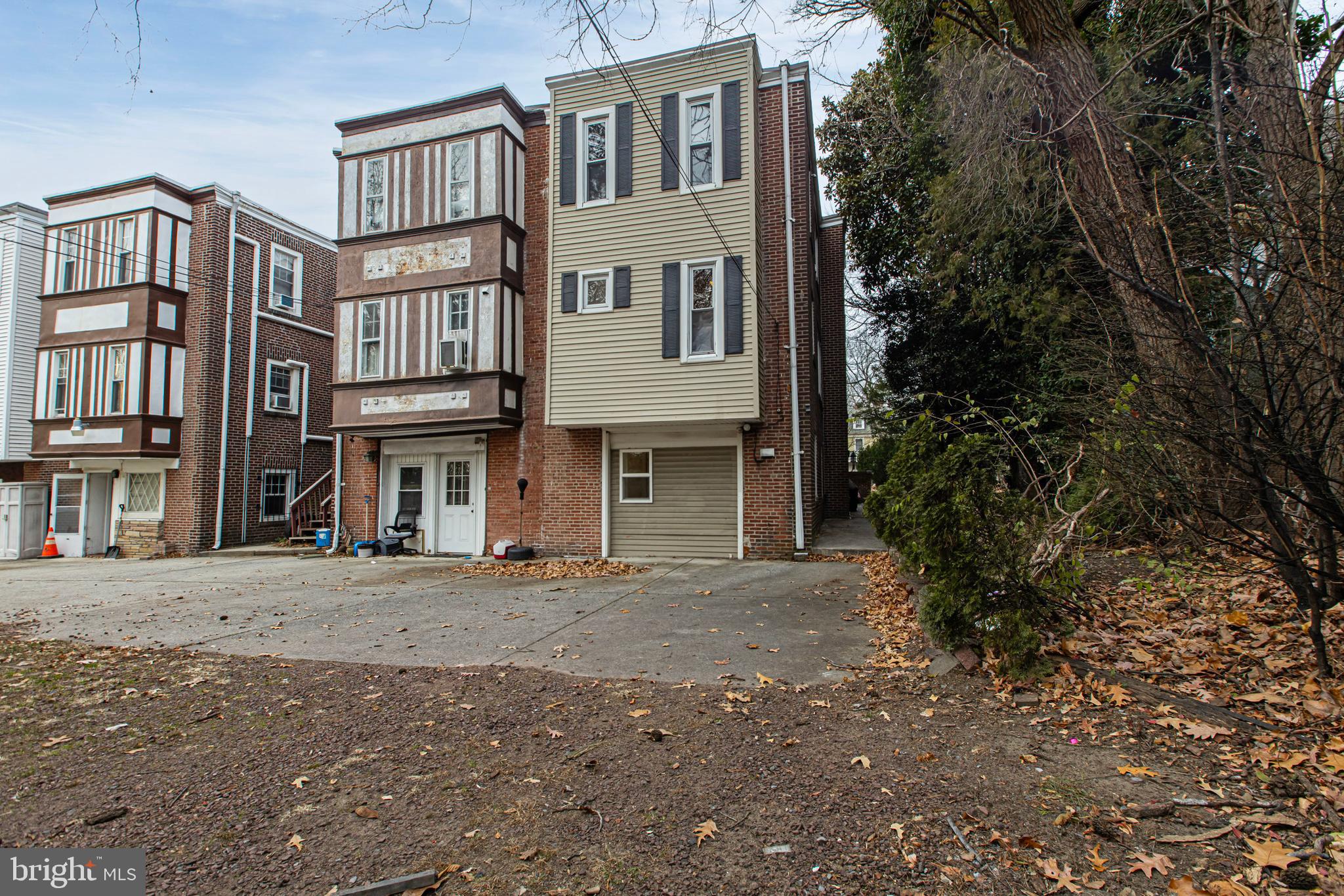 412 West Maple Avenue Merchantville, NJ 08109 - Photo 56 of 58 a front view of a house with a yard