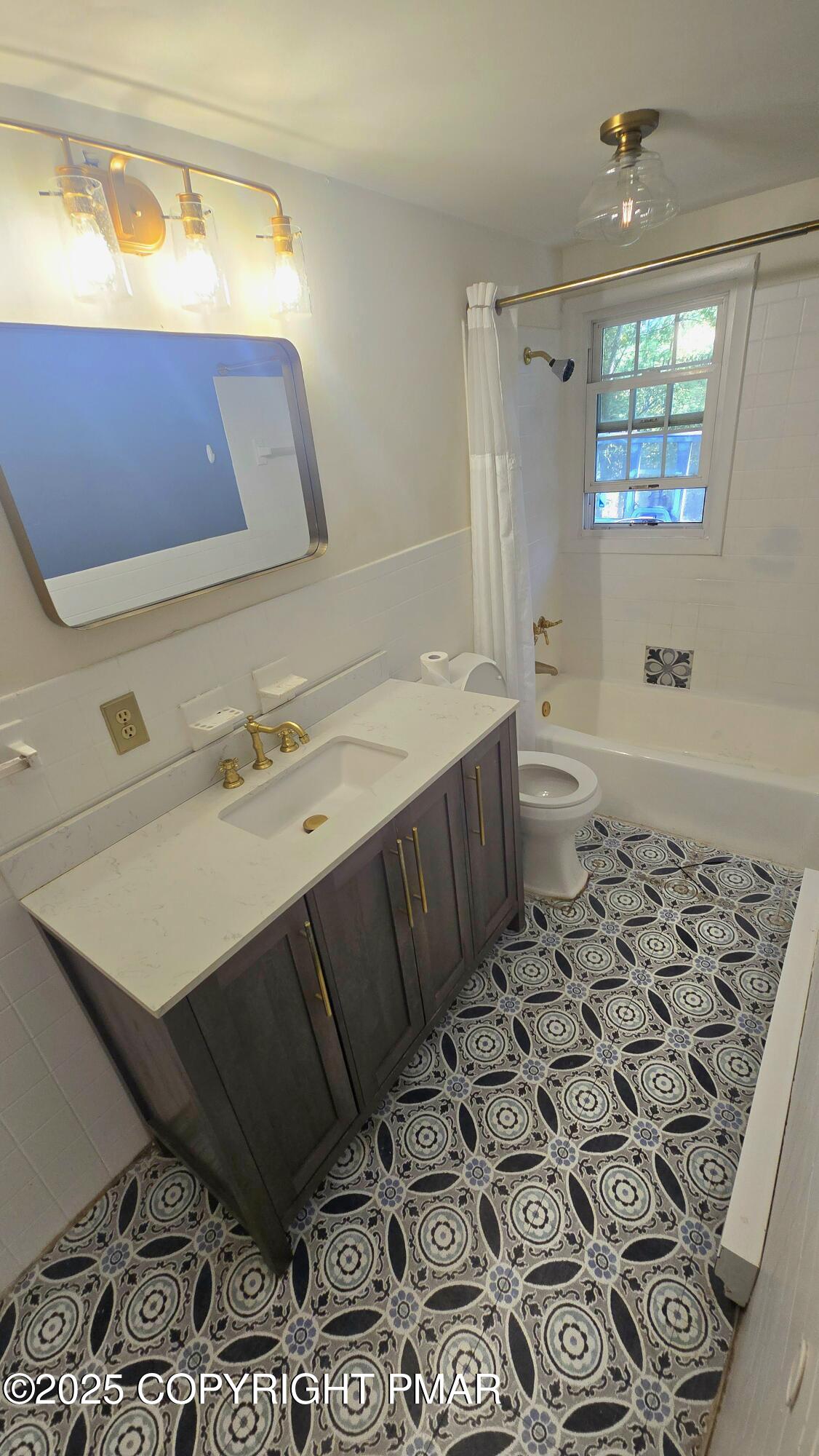 5550 Springhouse Lane Kunkletown, PA 18058 - Photo 20 of 41 a bathroom with a sink a toilet and shower