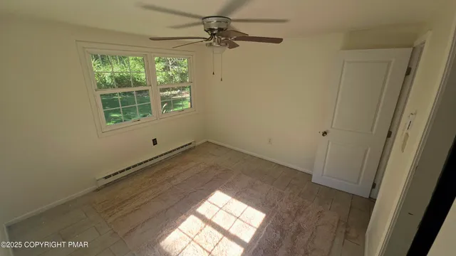 an empty room with windows