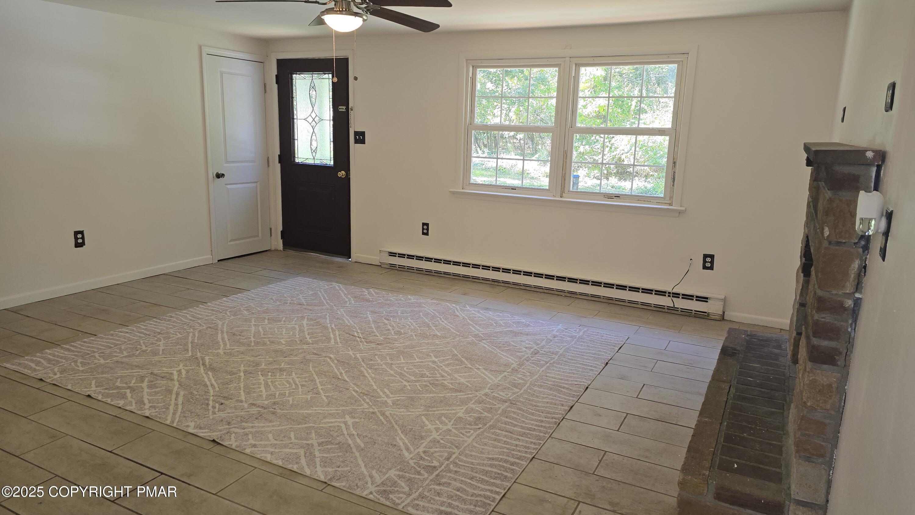 5550 Springhouse Lane Kunkletown, PA 18058 - Photo 3 of 41 a view of an empty room with a window
