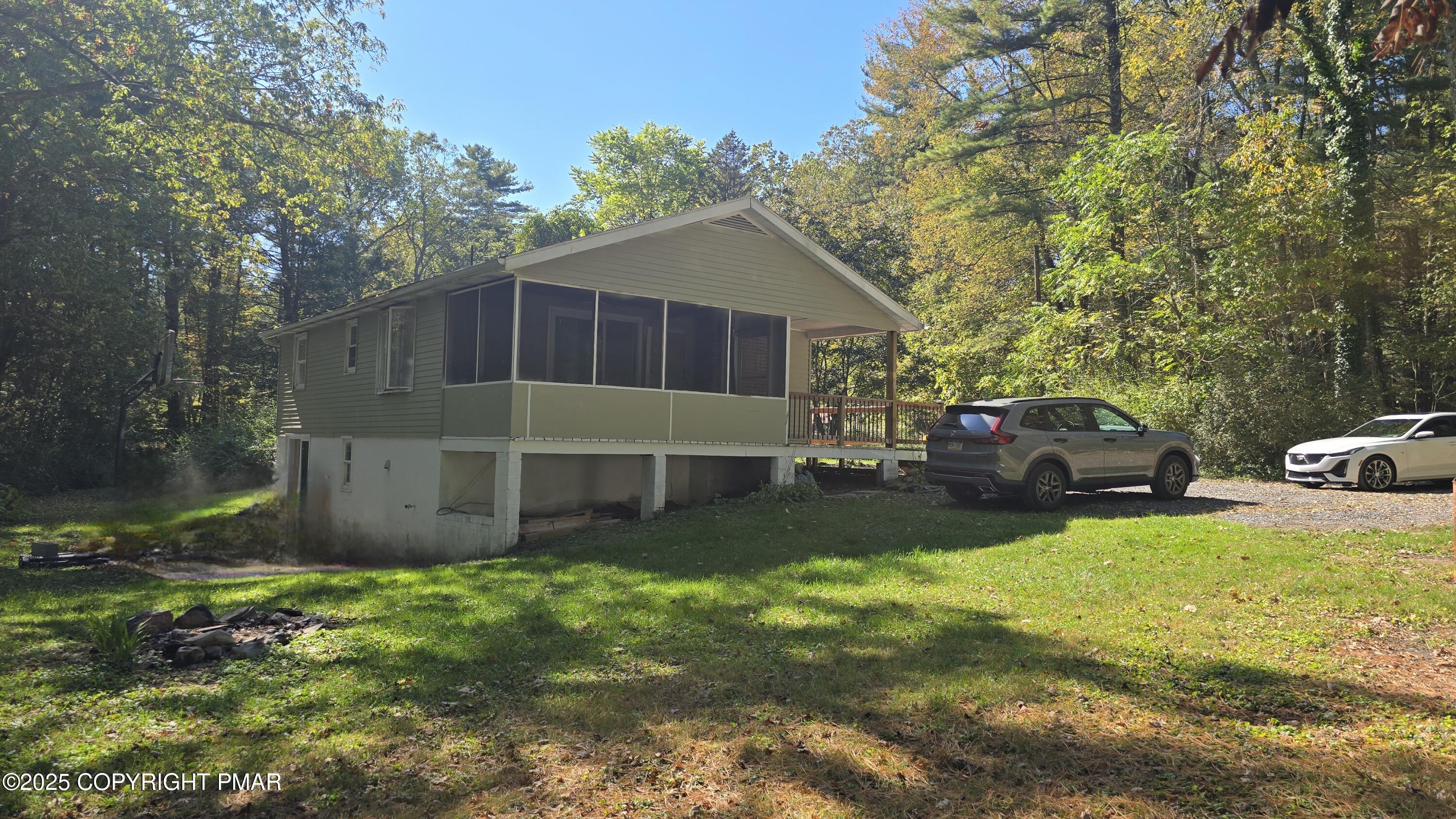 5550 Springhouse Lane Kunkletown, PA 18058 - Photo 36 of 41 a view of a house with a yard