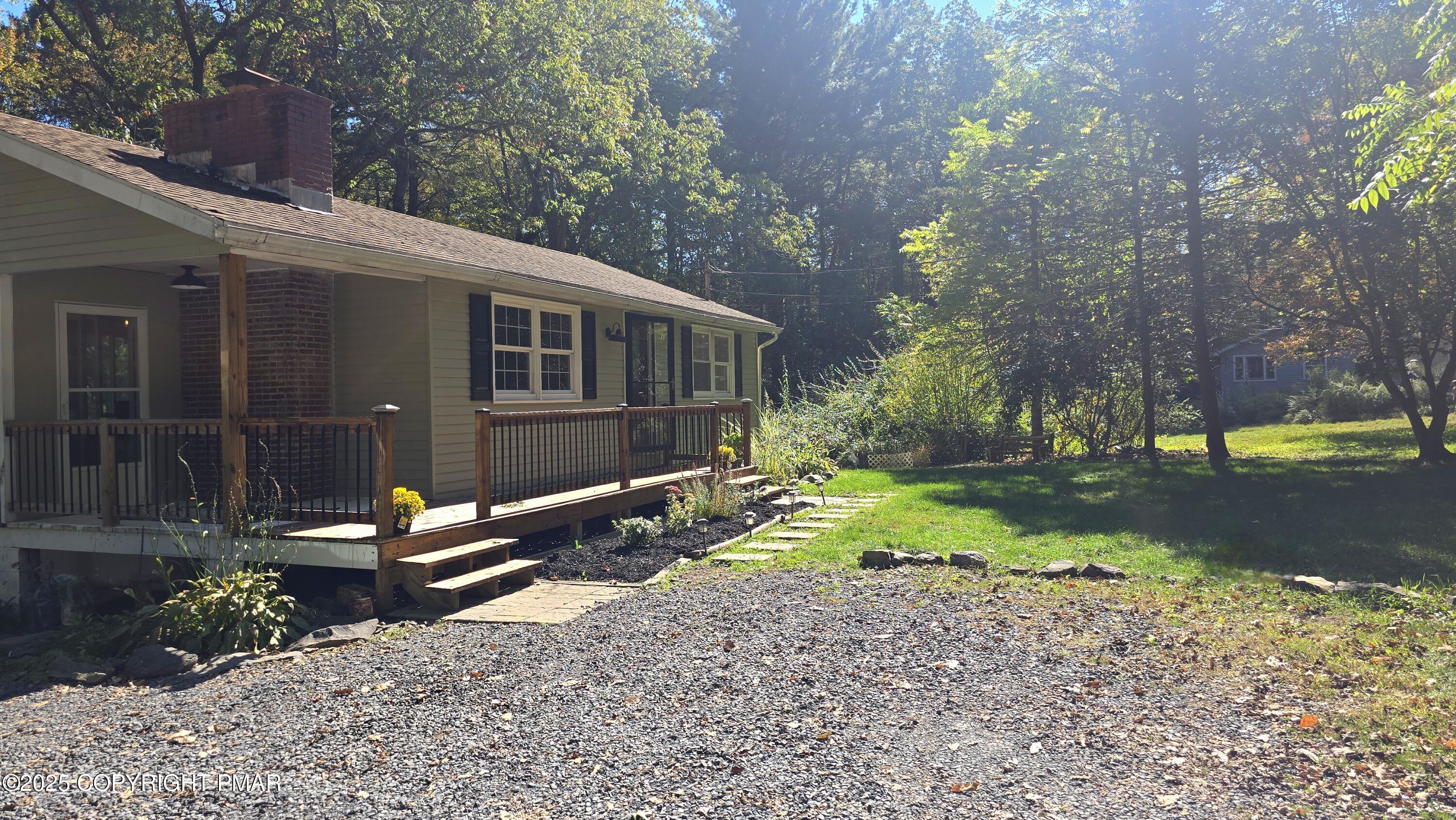 5550 Springhouse Lane Kunkletown, PA 18058 - Photo 37 of 41 a view of a house with backyard and trees