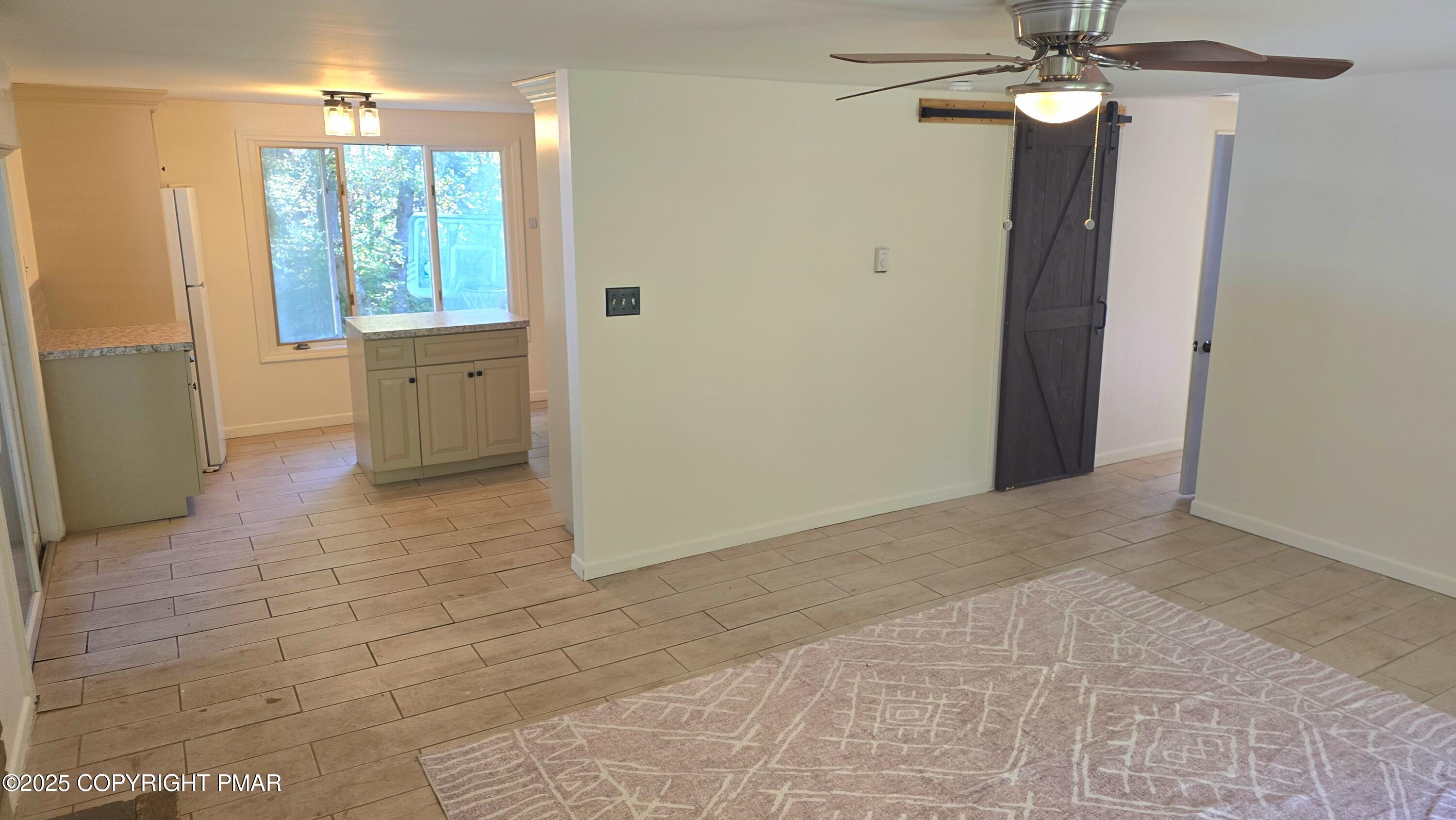 5550 Springhouse Lane Kunkletown, PA 18058 - Photo 8 of 41 a view of an empty room with a window