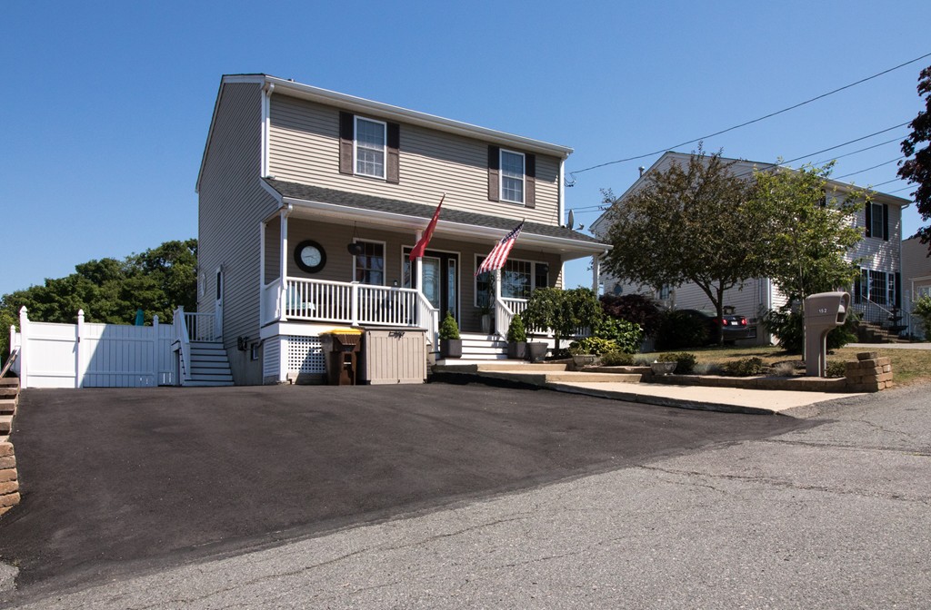 152 Carter Street Fall River, MA 02721 - Photo 1 of 30 a view of a street with cars