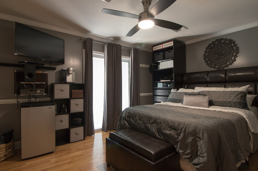 152 Carter Street Fall River, MA 02721 - Photo 15 of 30 a bedroom with a bed and wooden floor