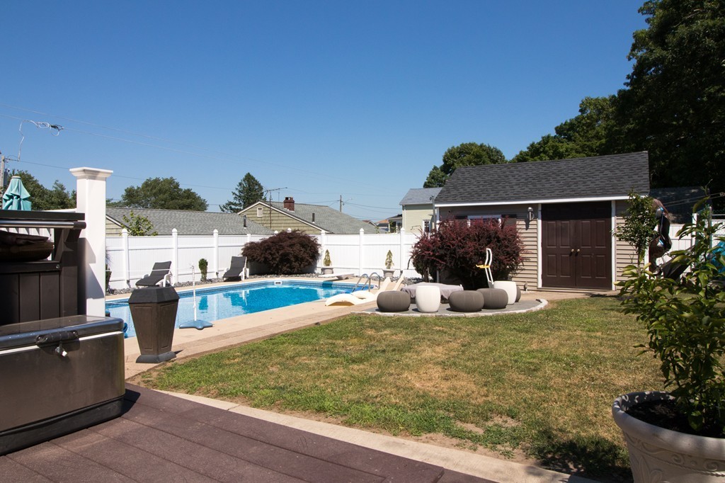 152 Carter Street Fall River, MA 02721 - Photo 28 of 30 a view of a house with backyard porch and sitting area
