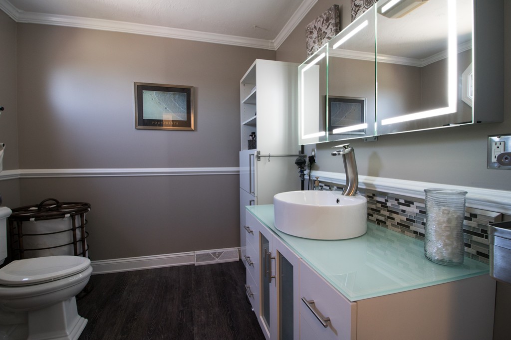 152 Carter Street Fall River, MA 02721 - Photo 10 of 30 a bathroom with a sink a toilet and mirror