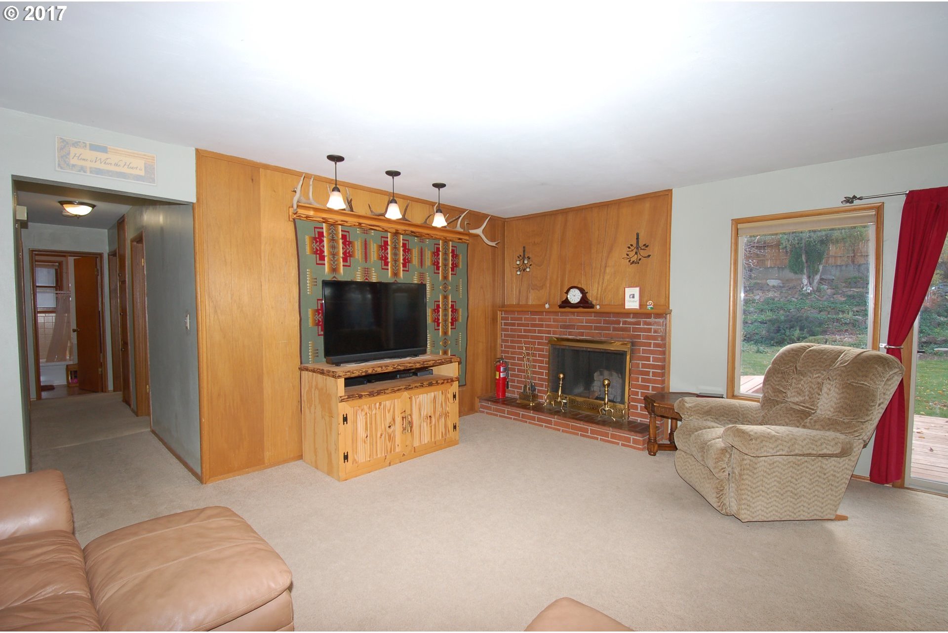 3130 Southwest Hailey Avenue Pendleton, OR 97801 - Photo 5 of 32 a living room with furniture and a flat screen tv