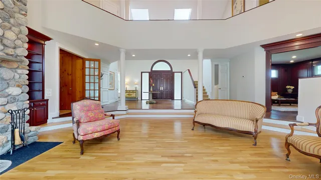 a bathroom with a large tub and sink