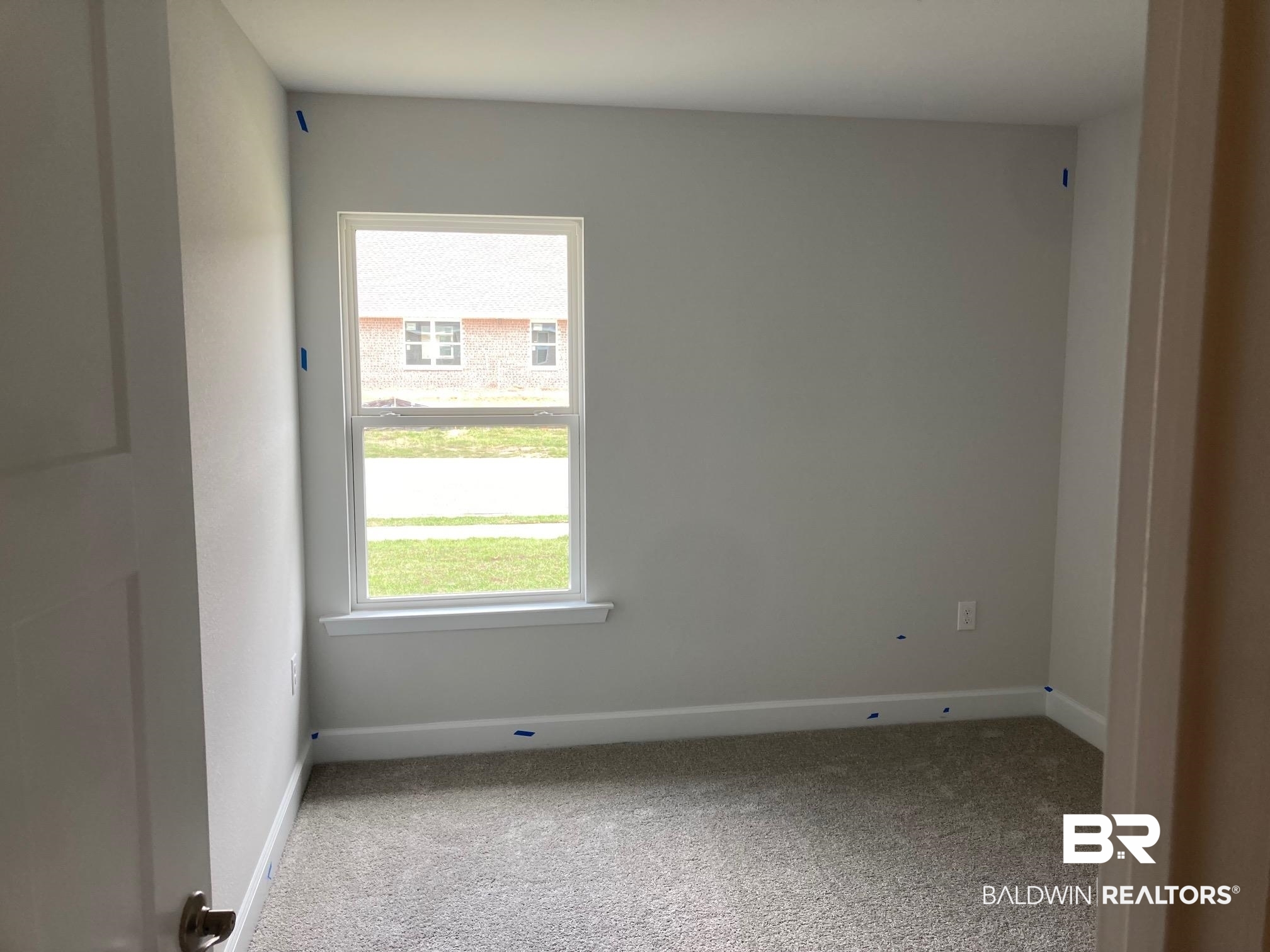 705 Mayflower Drive Foley, AL 36535 - Photo 14 of 19 Empty room featuring baseboards and carpet floors