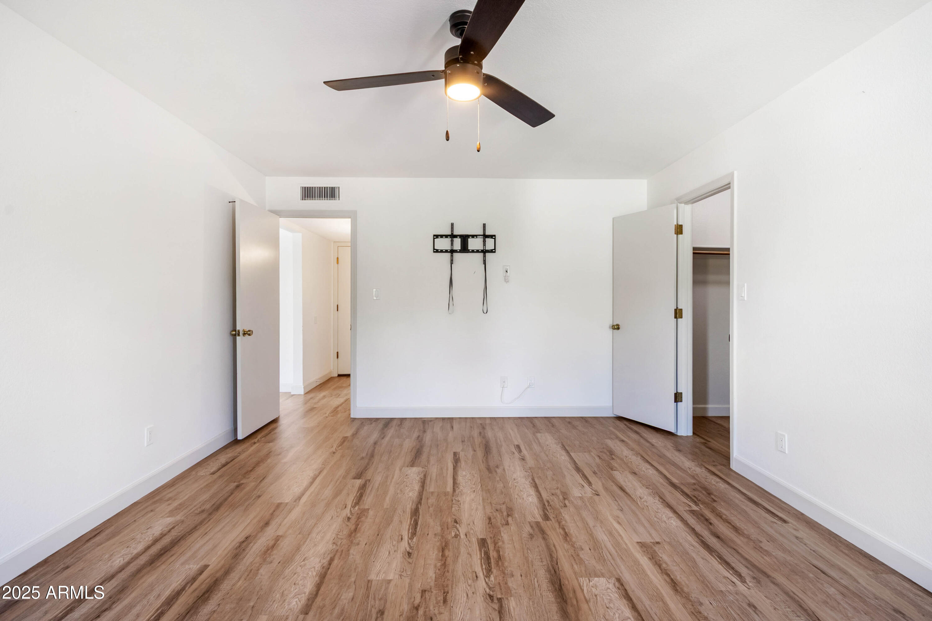 2228 East Jaeger Street Mesa, AZ 85213 - Photo 16 of 35 a view of empty room with wooden floor
