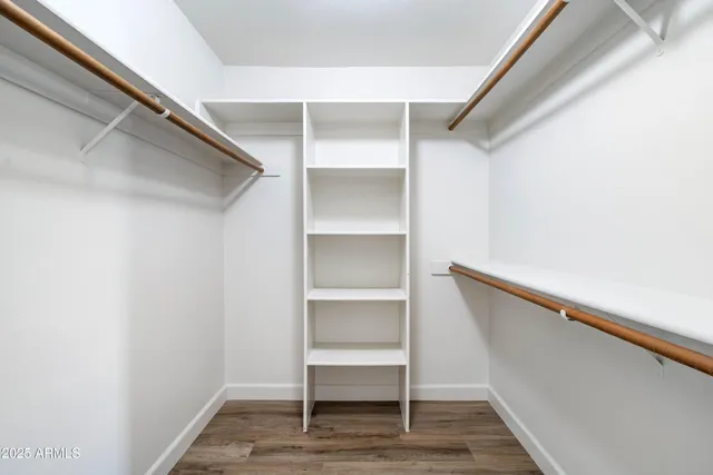 a view of an empty walk in closet