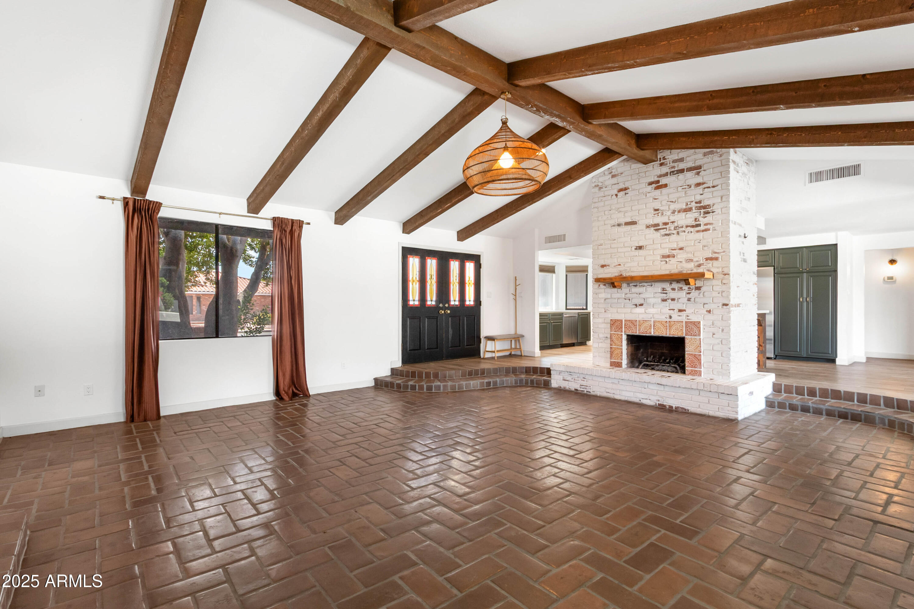 2228 East Jaeger Street Mesa, AZ 85213 - Photo 2 of 35 a view of empty room with fireplace and wooden floor