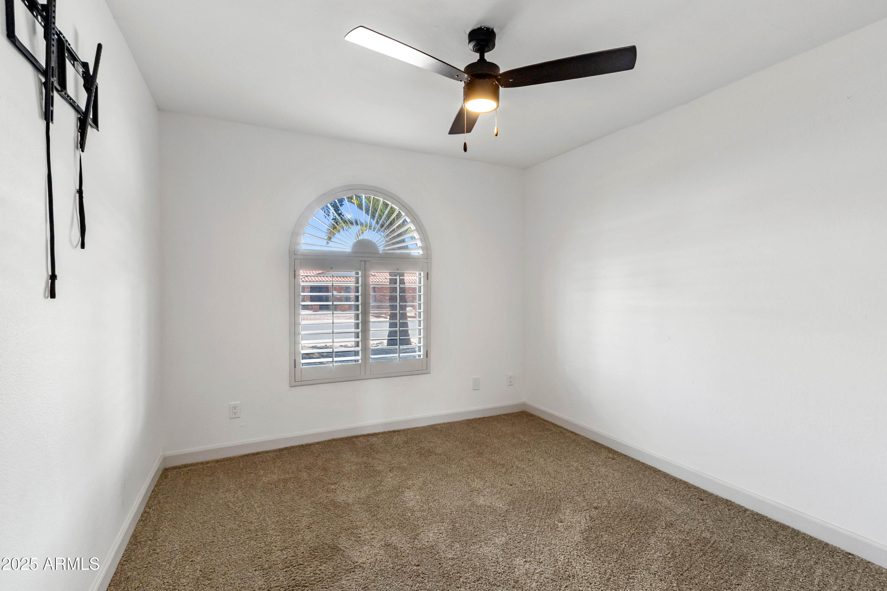 2228 East Jaeger Street Mesa, AZ 85213 - Photo 26 of 35 an empty room with a window