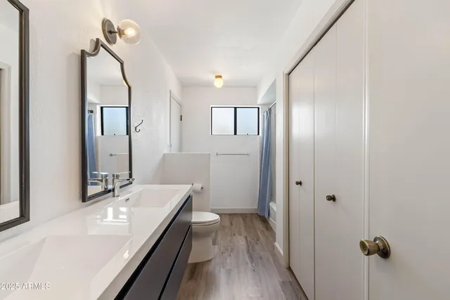 a bathroom with a bathtub and a sink